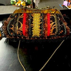 Bee generation tapestry and lace purse